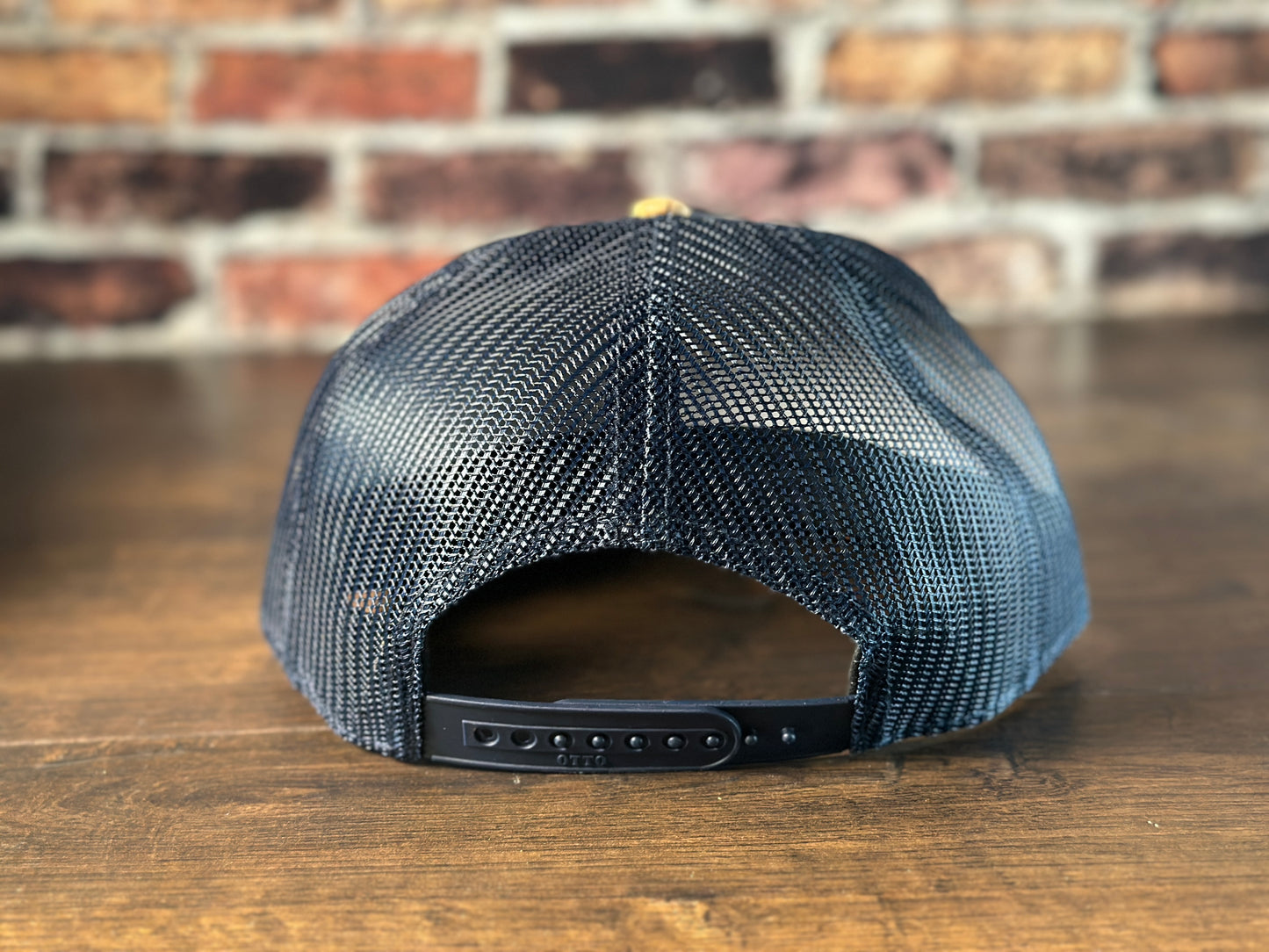 Wrath and Grace Logo Flatbill Snapback in Navy and Cork with Gold Patch