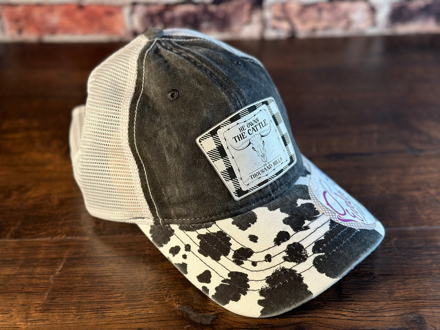 Ladies Psalm 50 Black Cow Print Ponytail Cap White Flannel Patch