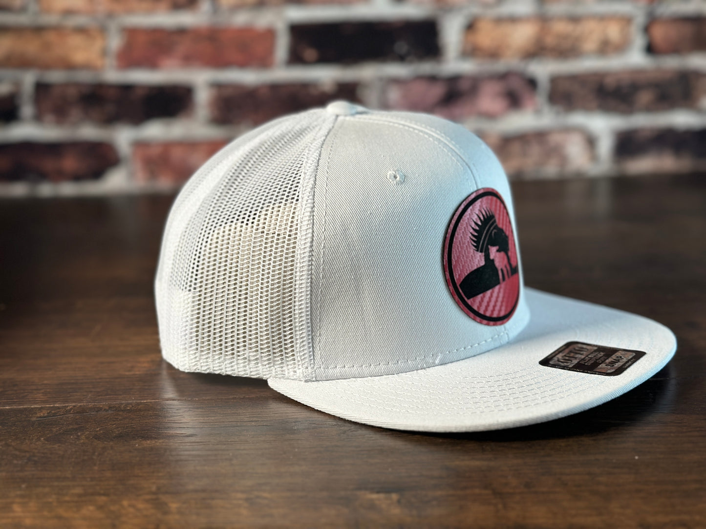 Wrath and Grace Logo Flatbill Snapback in white with carbon fiber red patch