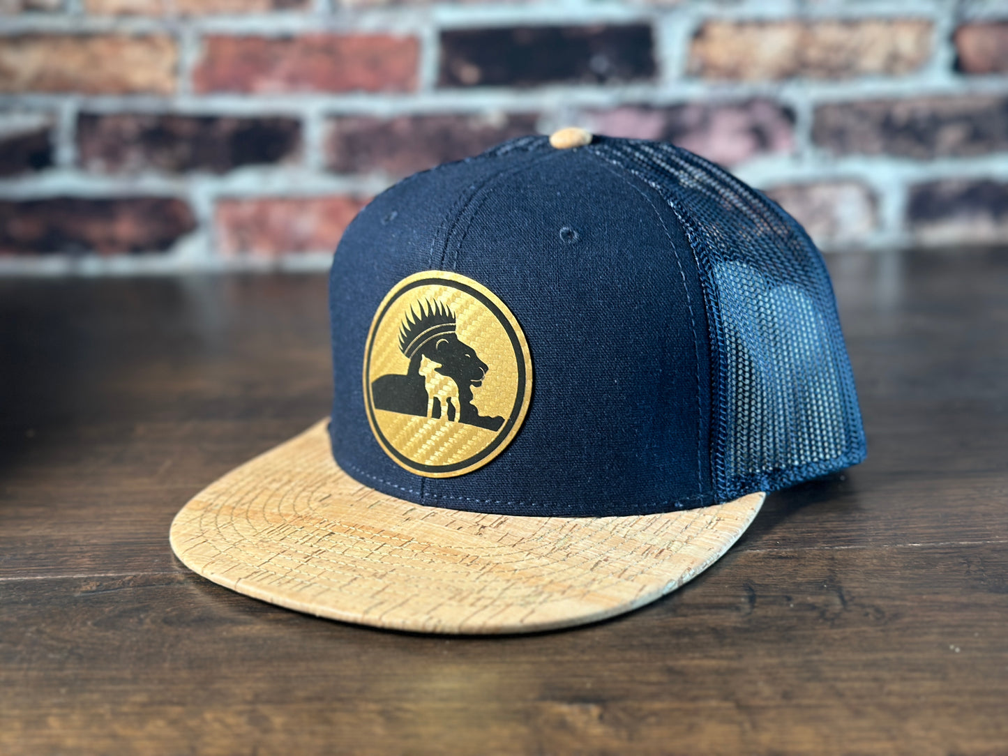 Wrath and Grace Logo Flatbill Snapback in Navy and Cork with Gold Patch