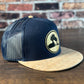 Wrath and Grace Logo Flatbill Snapback in Navy and Cork with Gold Patch