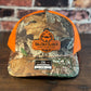 SDG Realtree Edge and Blaze Orange Trucker Hat with Orange Patch