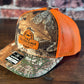 SDG Realtree Edge and Blaze Orange Trucker Hat with Orange Patch
