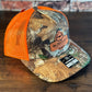 SDG Realtree Edge and Blaze Orange Trucker Hat with Orange Patch