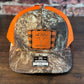 Psalm 50 Realtree Edge and Blaze Orange Trucker Hat with Orange Patch
