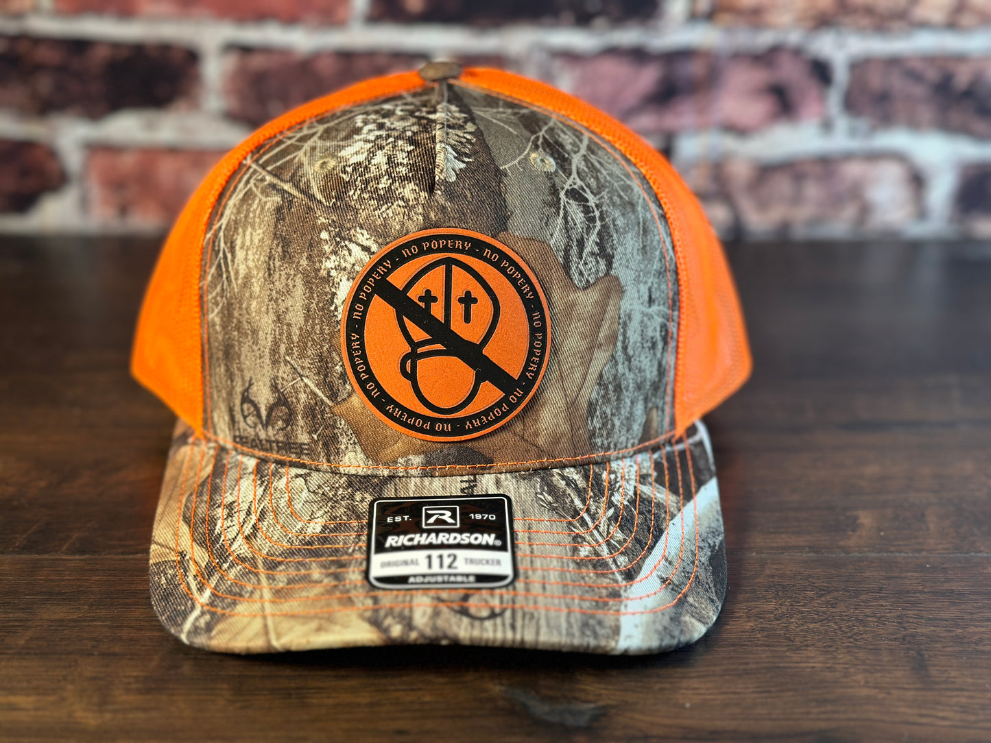 No Popery Realtree and Orange Trucker