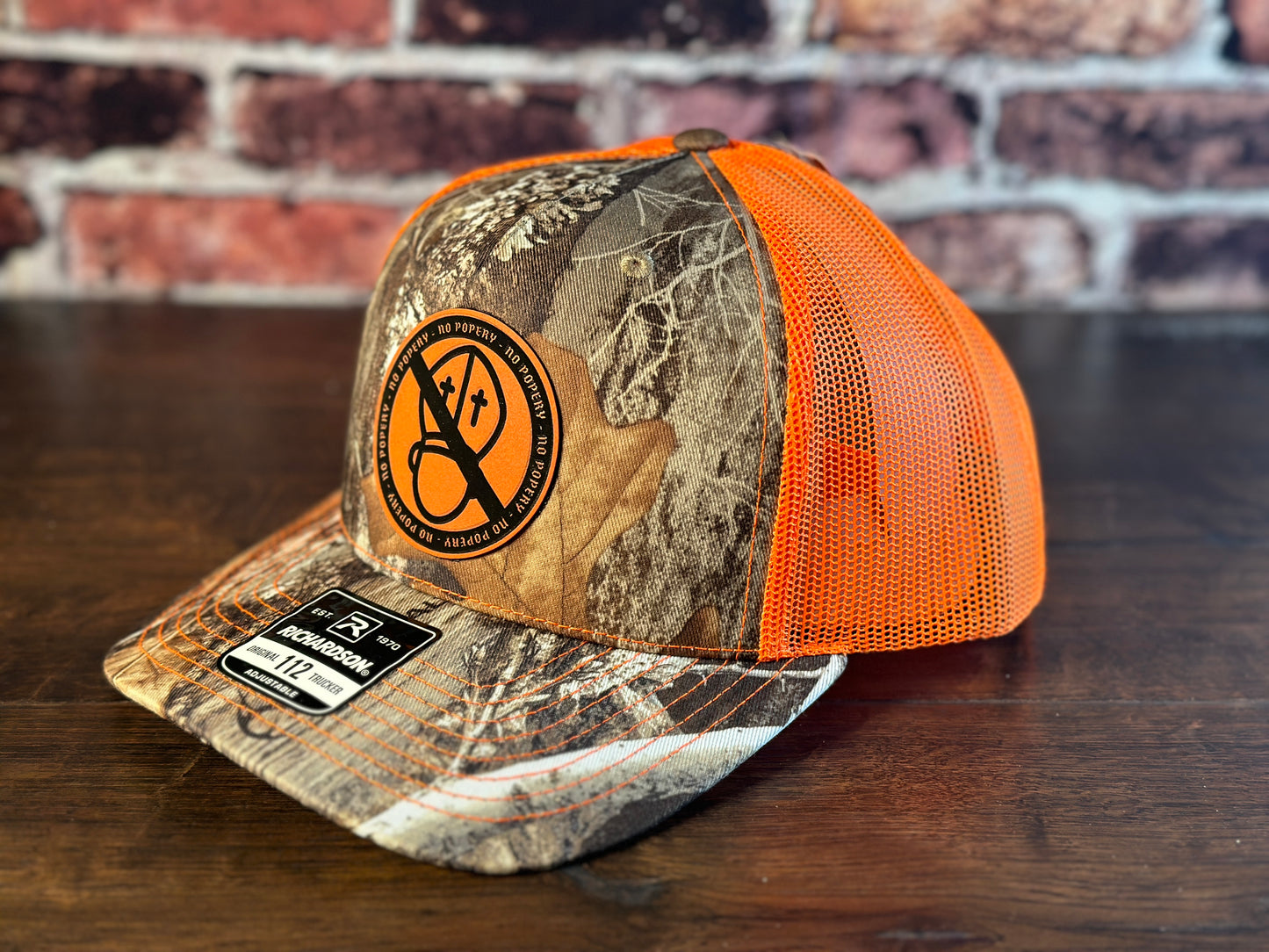 No Popery Realtree and Orange Trucker